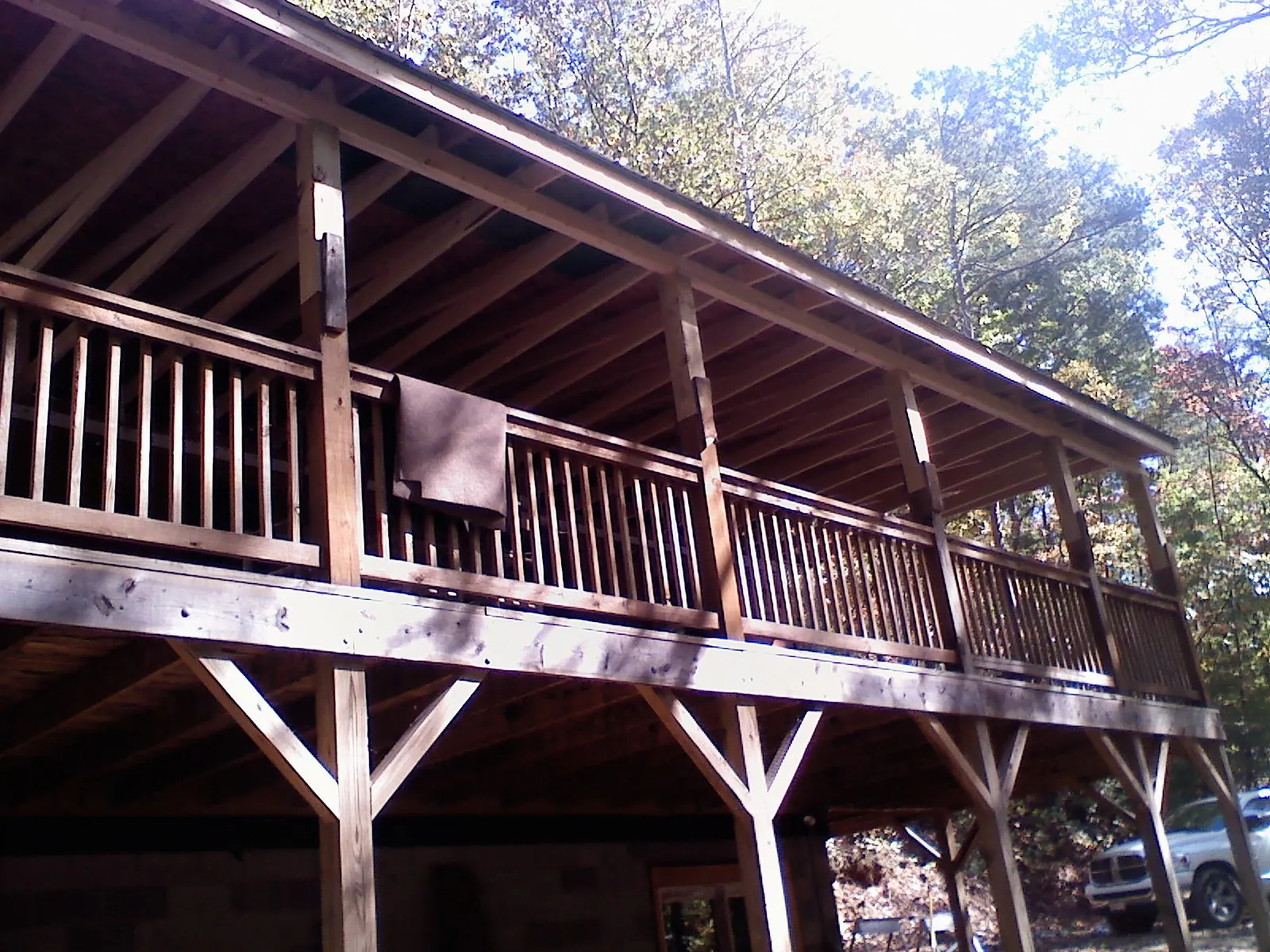Timber framing under a new elevated porch and deck — Roof Leak Repair in Logan by Roofing Brothers